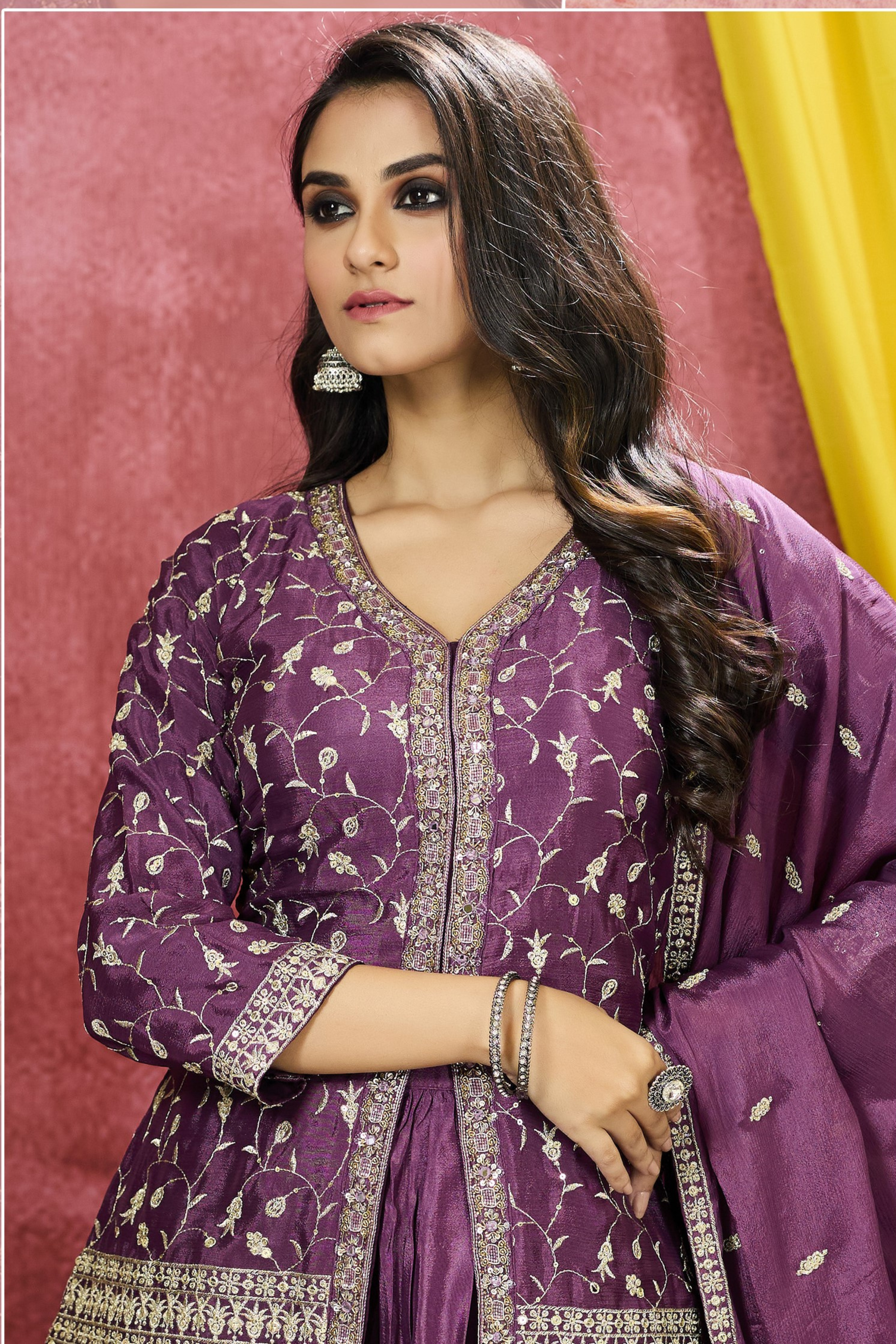 Look effortlessly classy in this old mauve peplum top with floral embroidery. Constructed from lightweight georgette fabric, this set is comfortable and perfect for any occasion. The matching skirt and dupatta complete the look and add a royal touch.